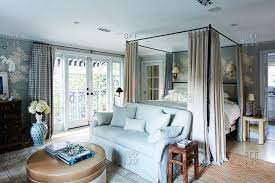 With a clever trifold design, this futon chair bed can be easily stored in small spaces after use. Los Angeles California October 4 2016 Sofa At The End Of A Canopy Bed In A Master Bedroom Stock Photo Offset