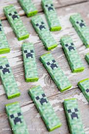 This post may contain affiliate links. Printable Minecraft Valentines With Creeper Gum Wrappers