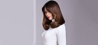 After you wash and condition your hair, rinse with cold water a few times. Smooth