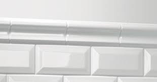 Crema marfil chair rail 2x12 polished marble of spain is a subtle elegant blend of golds and beiges and is available in a variety of tile sizes and mosaics. Daltile Finesse Bright White 2 In X 6 In Ceramic Chair Rail Trim Tile 0 06 Sq Ft Piece Fe0126crcc1p The Home Depot Bathroom Interior Design Chair Rail Budget Bathroom Remodel