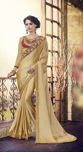 If a saree is maroon with black or golden lace then it create some magic with. Party Wear Golden Maroon Color Saree