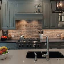 Bright kitchen with brick backsplash underneath the sleek white cabinets. 75 Beautiful Kitchen With Green Cabinets And Brick Backsplash Pictures Ideas April 2021 Houzz