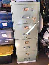 Lm olde tptoedrge metal filing cabinet. Leaded Vintage Filing Cabinet