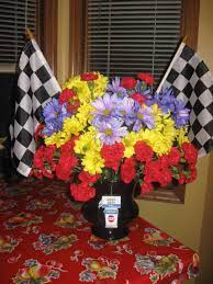 Select from premium nascar logo of the highest quality. This Arrangement Was For A Nascar Enthusiast It Had The Bright Colors Of The Nascar Logo Funeral Flower Arrangements Flower Arrangements Funeral Arrangements
