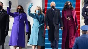 Michelle obama wears a plum overcoat and suit by sergio hudson for joe biden's inauguration. Ah8wsfmrhlu2pm