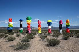 Tourists, sightseers, joggers, hikers and rock climbers will find the towering red cliffs full of wildlife, including burros, rabbits, coyotes, bighorn sheep, red tailed hawks, golden eagles, hummingbirds, wild horses, bobcats and mountain lions. Seven Magic Mountains By Uno Rondinone Designcollector