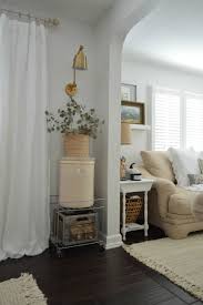 And a line of them on one wall can make a large room seem epic. Living Dining Room Fall Refresh And Our New Chandelier Sconces Living Room Living Dining Room Sconces Dining Room Wall