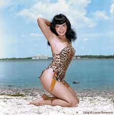 With bettie page, james dean, irving klaw, dixie barton. Bettie Page Posing In Miami Wearing Her Own Designed And Hand Sewn Leopard Bathing Suit B W Photo Taken By Bunny Yeager Coloriz Bettie Page Fashion One Piece