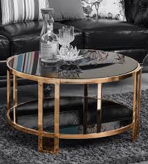 The elegant curve of the legs make this table a bit. Buy Alexa Coffee Table In Black Colour By Durian Online Round Coffee Tables Tables Furniture Pepperfry Product
