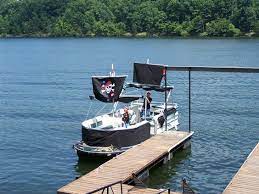 Pirate ship themed boat decorations. Decorate A Pontoon Into A Pirate Ship Atlanta Team Building Adventures Lake Lanier Islands Sailing Boat Boat Parade Pirate Boats