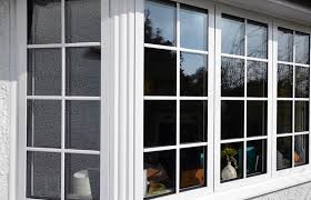 Bay windows are a set of windows that angle toward each other in a curve. Bay Windows Essex London Manchester Chigwell Window Centre