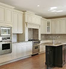 Off White Kitchen With Large Decorative Wood Hood Wall Oven Island Kitchen Ideas Modern White Kitchen Island Large Kitchen Design White Modern Kitchen