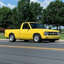 Image result for Bright Yellow 1990 Truck