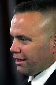 Mack taps his fourth acting cop director