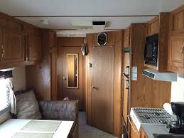 If you choose the queen bed option, it easily drops down from the roof for an easy conversion. 2005 Used Forest River Work And Play 38fk Toy Hauler In Virginia Va