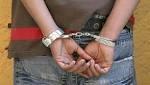 Mumbai: held 'abusive' post against
