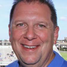 Jesuit brings back Mark Songy as football coach