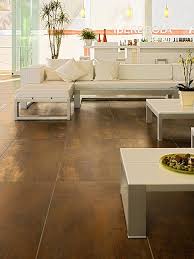 Nano Corten Copper Porcelain Provides An Impactful Contrast In This Sunlight Drenched Room This High Tech Performance Material Can B Luxury Tile Corten Decor