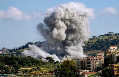 Smoke rises over a village in southern Lebanon following reported Israeli airstrikes.