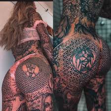 We have seen a number of floral tattoos already but compared to those, this one is pretty small but very beautiful at the same time. Dragon Girl Who Tattooed Her Eyeballs Shares Before And After Bum Lift Pics World News Mirror Online