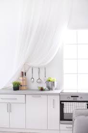 These simple and sleek shades by kirsch can drop down from the top or raised. 20 Kitchen Curtain Ideas That Are Seriously Drool Worthy