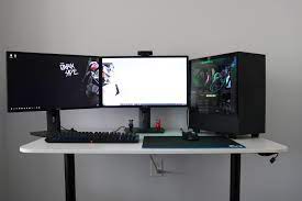 At 36 inches wide, this adjustable desk is perfect for those with a dual monitor setup or a larger workspace. My Dual Monitor Gaming Setup Pc Specs I7 8700k Titan Xp 16 Gb G Skill Tridentz Rgb Ram Gaming Setup Computer Gaming Room Gaming Computer Desk