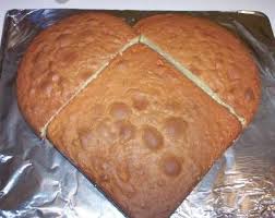 You Don T Need A Special Pan To Make A Heart Shaped Cake Just Pour The Batter Of Your Favorite Cake Mix Into One 8 Inch Squar Heart Shaped Cakes Food Recipes