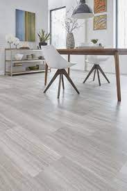 Keep Your Kitchen Up To Date Starting With Your Floor Use This Guide To The Hottest 2018 Kitch Grey Vinyl Plank Flooring Living Room Tiles Vinyl Tile Flooring