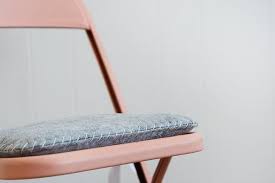 How To Make Super Cute Seat Cushions For Folding Chairs Hunker In 2020 Diy Chair Cushions Seat Cushions Diy Folding Chair