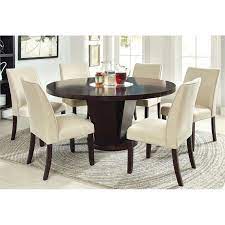 In many round dining tables, you can find a removable counter or a foldable one, which allows you to turn the table into half its size or store it elsewhere when not in use. Round Dining Table 7 Piece Set Off 52