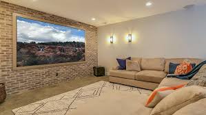 Do whatever you can to leave enough room on one insulated interior wall for the bed. consult an interior designer for layout options Basement Remodel Ideas To Try Forbes Advisor