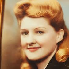 This is my lovely Nan, Florence Blake, nee Young (1913-1993). I believe my  Nan is pushing my Mum (or possibly my Uncle) somewhere in Southampton in  the mid to late 30's. The