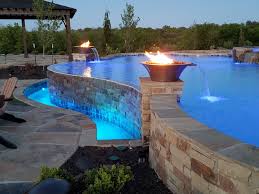 Infinity Edge Pool Overlooking Lake In Lenexa Ks Infinity Pool Backyard Infinity Edge Pool Backyard Pool Designs
