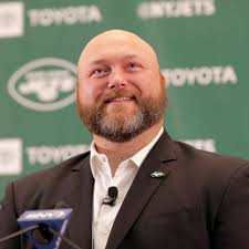 Jets' Douglas fills out staff with Hogan, Savage, Alexander