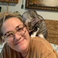 Adopting two 10-year-old cats in Austin