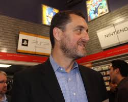 GameStop debuts a "store of the future" as online threat looms