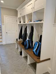 Between 16 on the short side and 18 on the high side. How To Make A Mudroom With Stock Cabinetry