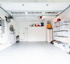 Learn how to build simple, cheap garage storage shelves that use the wasted space above your garage door! 10 Budget Friendly Diy Garage Organization Ideas
