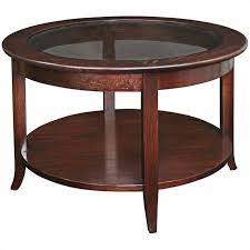 Distressed wooden planks show their natural knots and grain in this elegant, sturdy design. Bowery Hill Solid Wood Round Glass Top Coffee Table In Oak Walmart Com Walmart Com