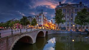 Influencer falls 160ft to her death in livestream with phone still in hand. Hd Wallpaper Netherlands Canal Amsterdam Europe Water Dusk City Cityscape Wallpaper Flare