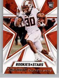 Amazon.com: 2021 Panini Chronicles Draft Picks Rookies and Stars #315 Chuba  Hubbard Oklahoma State Cowboys Official NCAA Football Trading Card in Raw  (NM or Better) Condition : Collectibles & Fine Art