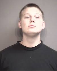 Man accused of causing two small explosions in Columbia residence