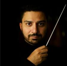 Biography conductor Jonathan Mann