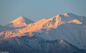 The white mountains are a mountain range covering about a quarter of the state of new hampshire and a small portion of western maine in the united states. Sunrise Light On The White Mountains