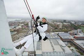 Daring 101-Year-Old Woman Becomes World's Oldest Abseiler by Descending the  Side of Tower