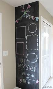 Light, subtle strokes are key here—you don't need a ton of paint. A Diy Chalkboard Wall Just A Girl Blog