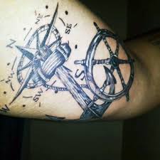Clear ship for action, ahoy! 70 Ship Wheel Tattoo Designs For Men A Meaningful Voyage