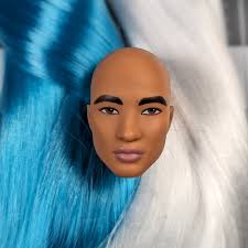 So, last week I used Brandon's body for a Barbie Extra Ken head. That means  this week I'm putting Brandon's head