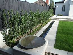 This stacked stone water feature really appeals to me because of the simplistic design and natural this isn't just a water fountain, it's a piece of modern art! Water Feature And Ponds Specialists Serenity Landscaping Kent