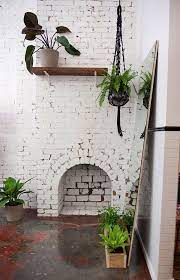 A 50/50 solution of water to white latex paint, stirred to an even consistency. B L O O D A N D C H A M P A G N E C O M White Brick Painted Brick Indoor Plants